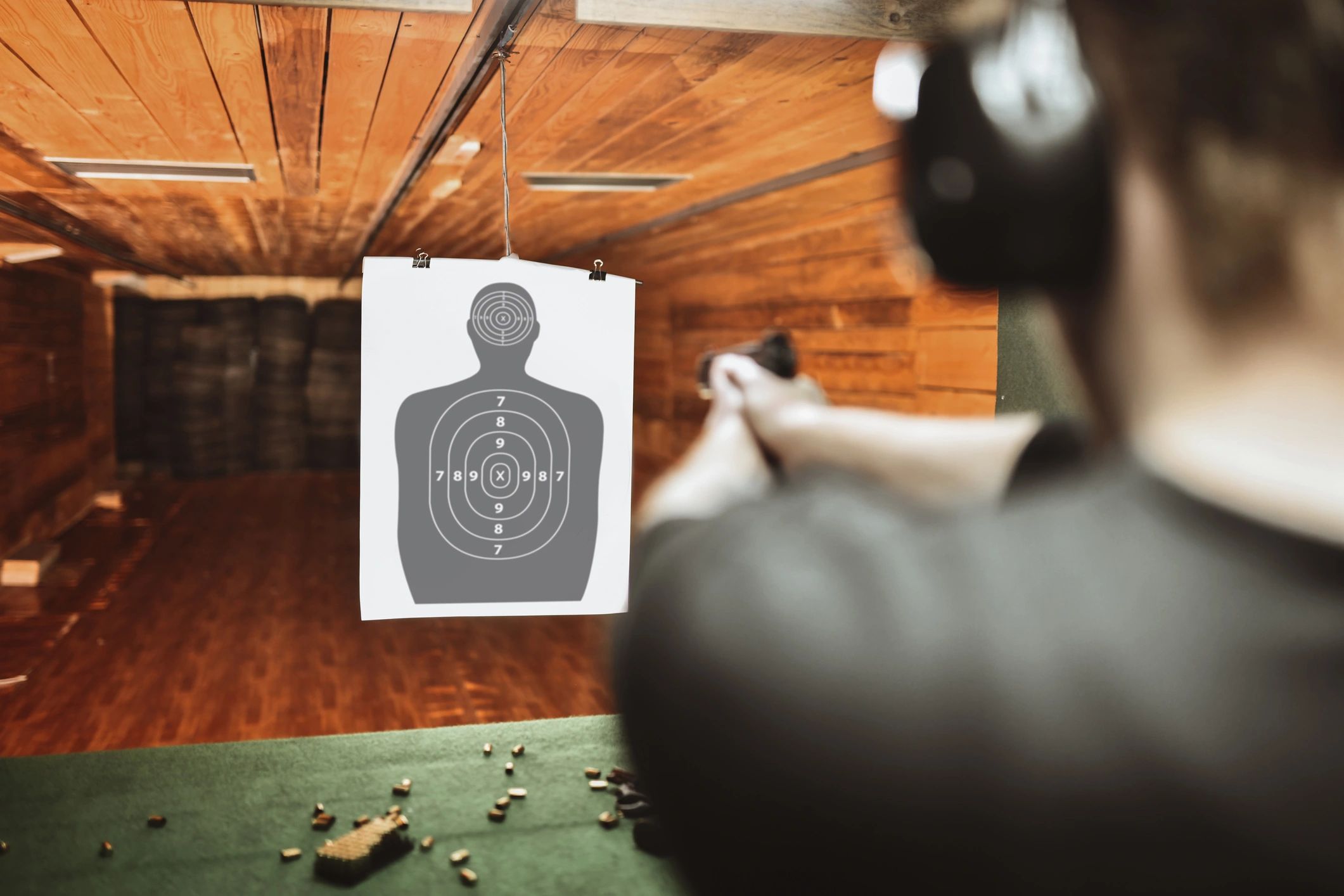 Customer at an indoor shooting range